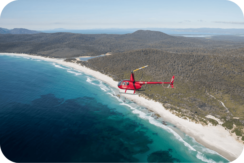 a plane flying over a body of water