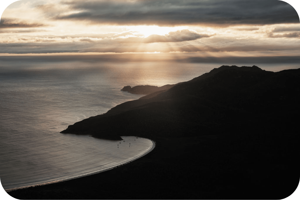 a sunset over a body of water